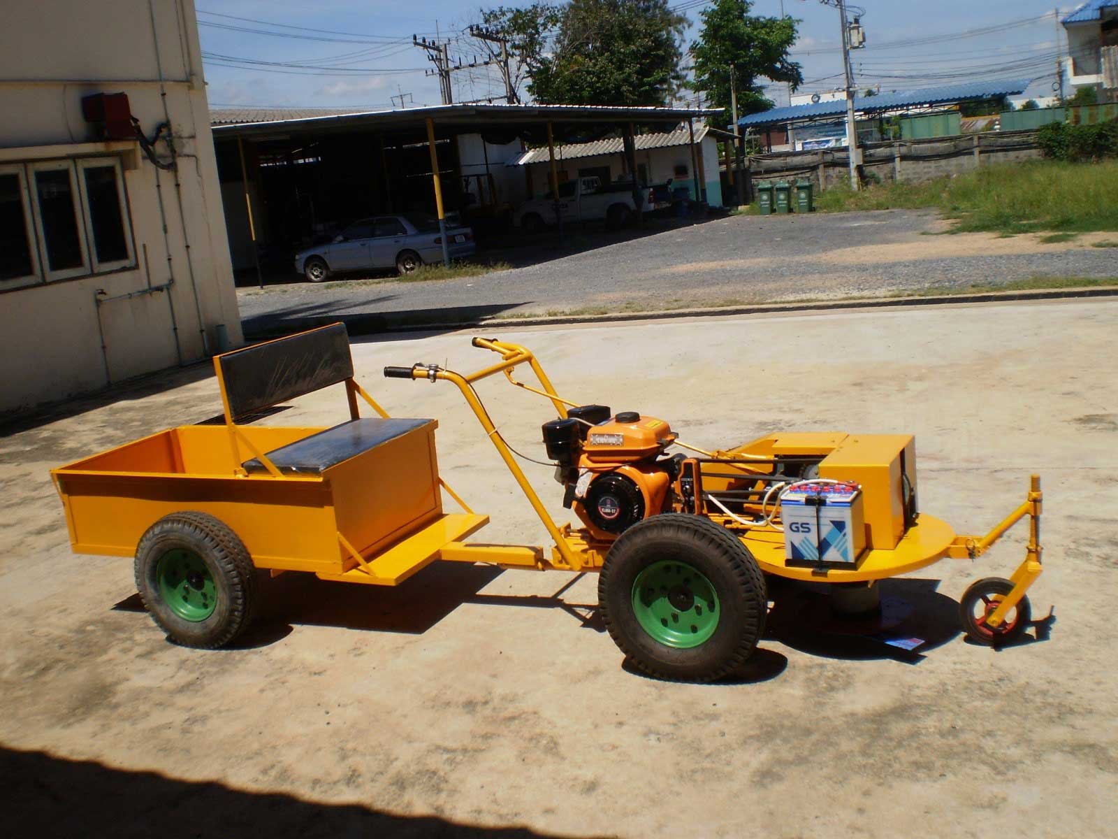 รถตัดหญ้านั่งขับ 4 ล้อ พ่วงเทเลอร์รุ่น T - 594